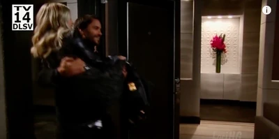 Dante carries Lulu over the threshold