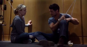 Handcuffed to a wall