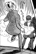 Vena is shot by 003's gas gun. Note the pantsuit instead of her better-known manga outfit.