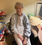 Piano (age 106) wearing a hair net in September of 2023, the last known photo of her.