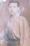 Koide as a young man.
