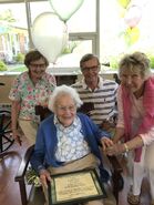 Barton (aged 109) with three of her eldest children.