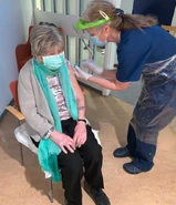 Carlsson (aged 108) being vaccinated against Covid-19 on 23 February 2021