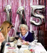 Benegas on her 115th birthday in 2022.