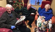 McEvilly (aged 104, on the left) celebrating the 75th anniversary of his marriage with his wife Kathleen (aged 96, on the right) and his son John (in the center) in January 2021