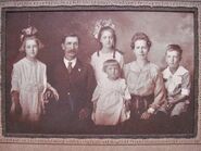 Around 1917, with her family (from left to right: Bernice (second child), John Alfred (father), Maude (first child), Ellen (mother), Harmon (third child), and baby Corinne)