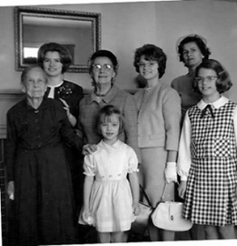 Grace (in the middle with the glasses and the hat), her mother (left) and other relatives