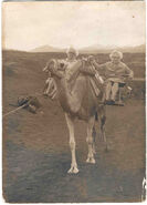 Lamm de Altschul (right; aged 100) and her daughter Ines (left) riding a camel