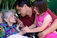 Sagor Maas on her 111th birthday with her great-nephew Tony Tovar and his daughter.