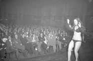 Rowland (age 30) performing before male audience in 1946.