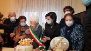 Capozzo (centre) on her 110th birthday in January 2021