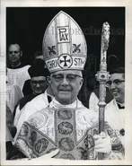 86.png (689 KB) Howard (age 86) dressed in a golden cloak and mitre and carried a golden staff on May 15, 1964