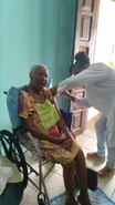 Maria Sao Pedro Conceicao in February 2021 at the claimed age of 119, being vaccinated against Covid-19.