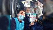 Gugliotti (center; aged 110) on 19 March 2021, after being vaccinated against COVID-19.