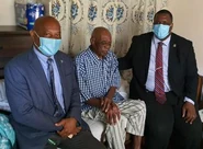 William Rhymer6.jpg (23 KB) Rhymer (center) on his 104th birthday with Andrew Fahie (right) and Vincent O. Wheatley (left) in 2020