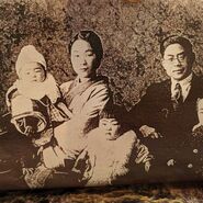 Hayashi at the age of 28, with her husband and children