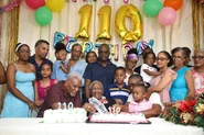 Rita Smyke with her family on her 110th birthday in 2023.