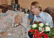 Juniewicz celebrating her 112th birthday in 2018, pictured with GRG Poland correspondent Waclaw Jan Kroczek.