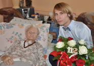 Juniewicz celebrating her 112th birthday in 2018, pictured with GRG Poland correspondent Waclaw Jan Kroczek