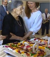 Marques standing on her 110th birthday in 2018.