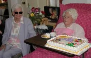 Beard on her 110th birthday with her daughter, Eunice Brandon in 2003