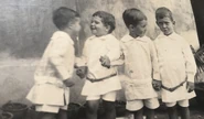 MichaelWrightFriends.jpeg (145 KB) Wright (second from left) as a boy with his brother and friends.