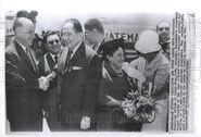 Francisco Orlich (far left), Miguel Ydigoras (second from left), First lady of Guatemaula (second from right), Marita Camacho Quiros (far right) putting a flower pin on Maria Teresa Laparra de Ydigoras in 1962.