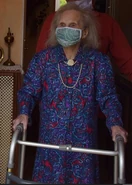 Albertine Miton standing on her 111th birthday in 2021.