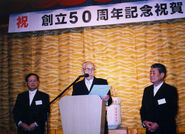 SMomoi104.jpg (38 KB) Sakari Momoi at age 104, while speaking at the ceremony of 50th anniversary of the school, in which he worked as a teacher.