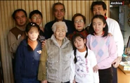 Tanaka with her family in the 2000s