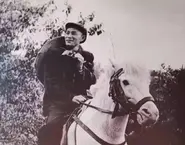 Zhang Lixiong riding a horse in Yunnan in 1955.