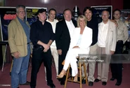 Richard Edlund, Terrence McDonnell, Stu Phillips, Glen A. Larson, Laurette Spang, Richard Hatch, Peter Berkos (age 81), and Ken Larsen at a movie reunion in 2003.
