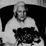 Cooper (age 108) on her 108th birthday with flowers she received on October 19, 1990.