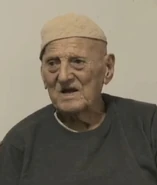 Ibush Ademi on his 107th birthday in 2025.