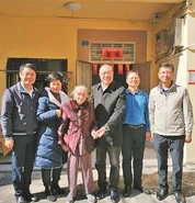 Huang Changjiao standing in April 2021, at age 111.