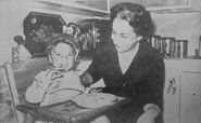 Camacho Quiros with her son in 1962.