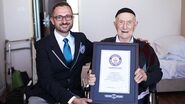 Aged 112, receiving his World's Oldest Man certificate from Marco Frigatti, Head of Records at Guinness World Records, 11 March 2016