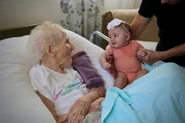 Mitchell on her 109th birthday in 2022, with her great-great-granddaughter Tensley