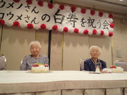 Koume Kodama (left) and Umeno Sumiyama (right) celebrating their 99th birthday