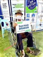 Bandang in 2021, after being vaccinated against Covid-19.