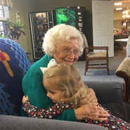 Phillips hugging a family member in an undated photo