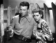 Hunt with John Wayne in a movie in 1937