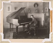 Berlin (age 23) about the play the piano in 1911.