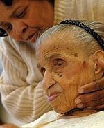 Tillman at the age of 114 with great-granddaughter Carol Stewart.