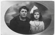 Giacopini as a child in the 1920s, pictured with the woman who raised her, Maria Chini