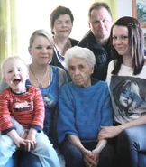 Frieda Szwillus at age 110, with family.
