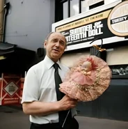 Lawler (age 56, restored) holding the famous doll in front of his play in 1977.