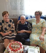 Mustafa Dzafic104.jpg (138 KB) On his 104th birthday with his daughters in 2022.