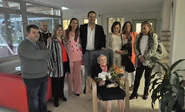 Pilar Yague Sanchez (seated) celebrating her 107th birthday in October 2019