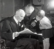 Suchár at the age of 110 with a grandson and a great-granddaughter.